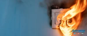 A fire is burning in the wall of an electrical outlet.