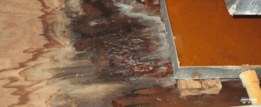 A close up of the floor with rust on it