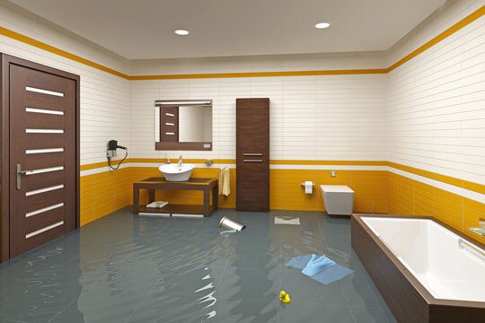 A bathroom with water running down the walls and floors.