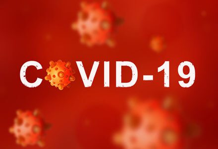 A red background with the word covid-1 9 written in white.